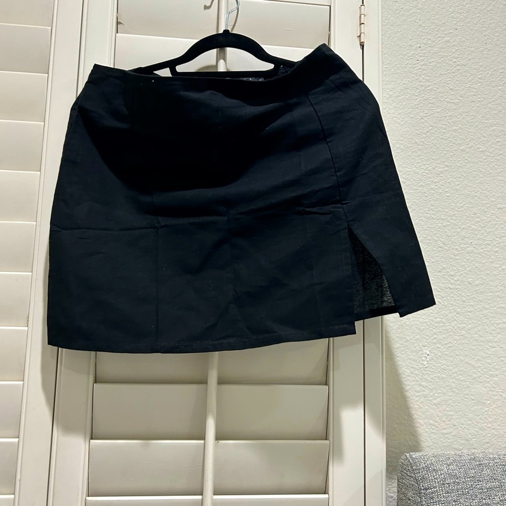 Princess Polly black mini skirt